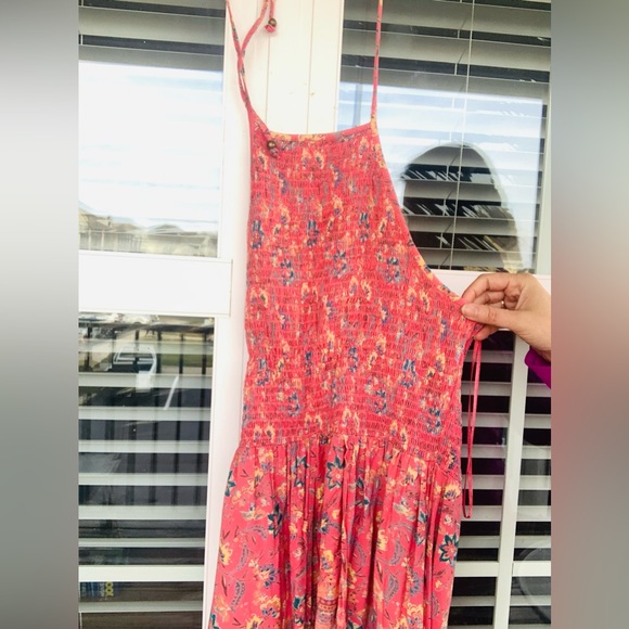 Floral Split front romper with attached shorts and smock halter top. - Picture 5 of 13